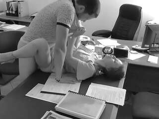 The boss fucks his tiny secretary on the office table and videos it on hidden camera